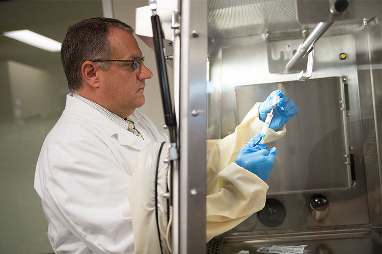 doctor filling syringe 