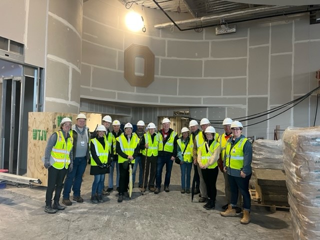 Marissa and DesignGroup team touring the hospital tower construction site