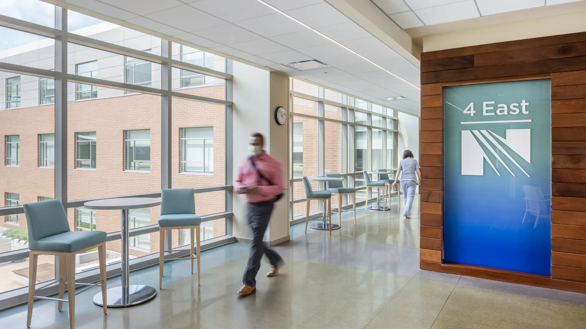 hospital corridor with floor-to-ceiling windows