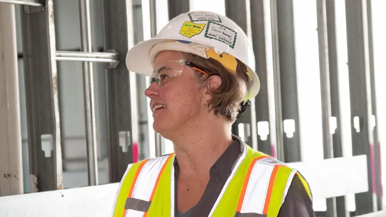 Woman, Jamie Oxier, on a construction site wearing safety gear