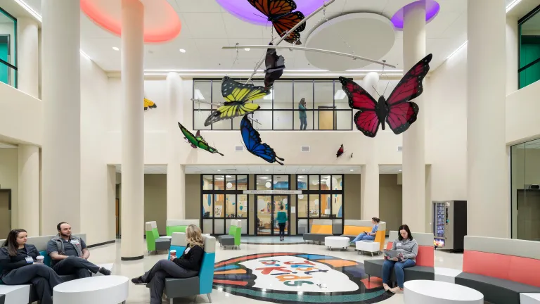 central lobby with 3-dimensional butterflies hanging from ceiling