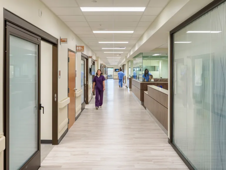 emergency department corridor with textured glass dividers