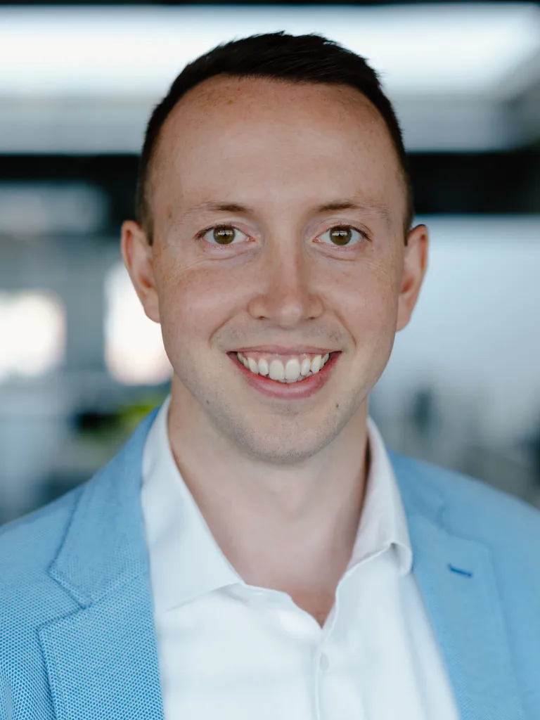man in light blue sports coat