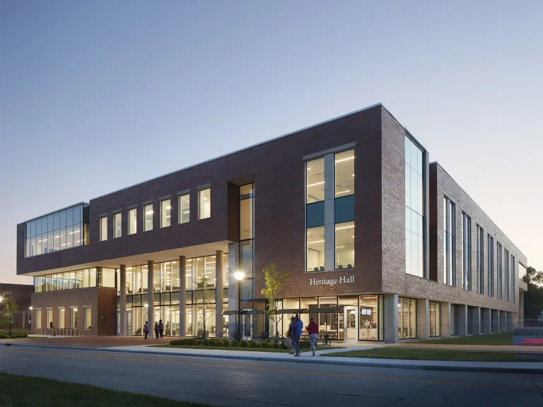 Exterior view in the evening of Heritage Hall.