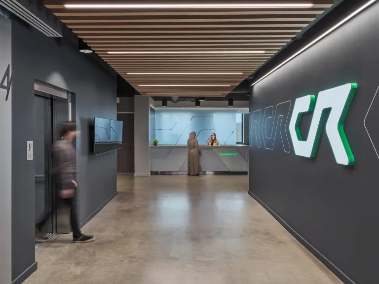 Corridor space in an industrial style corporate office building.