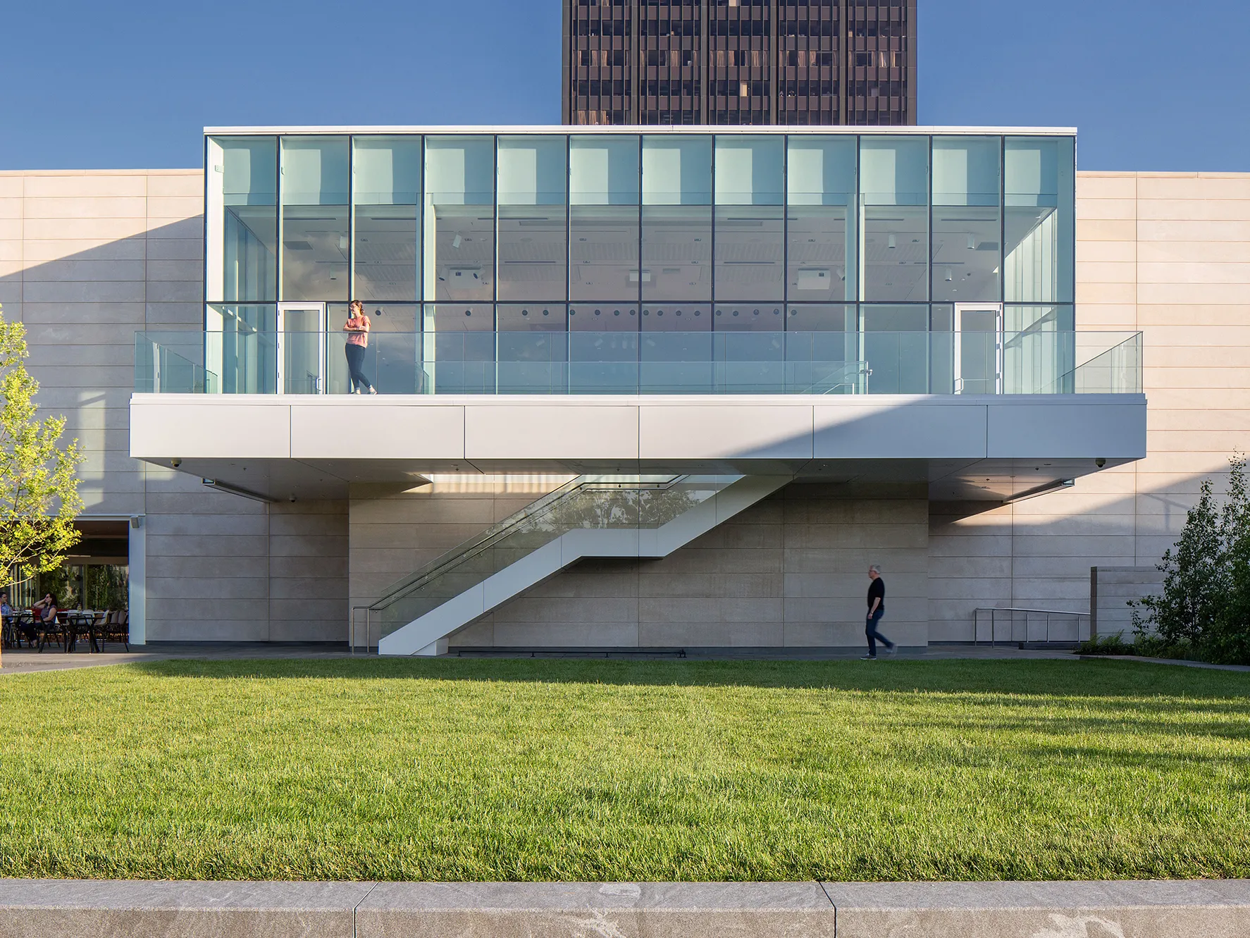Exterior view of someone standing on a balcony at the Columbus Museum of Art.