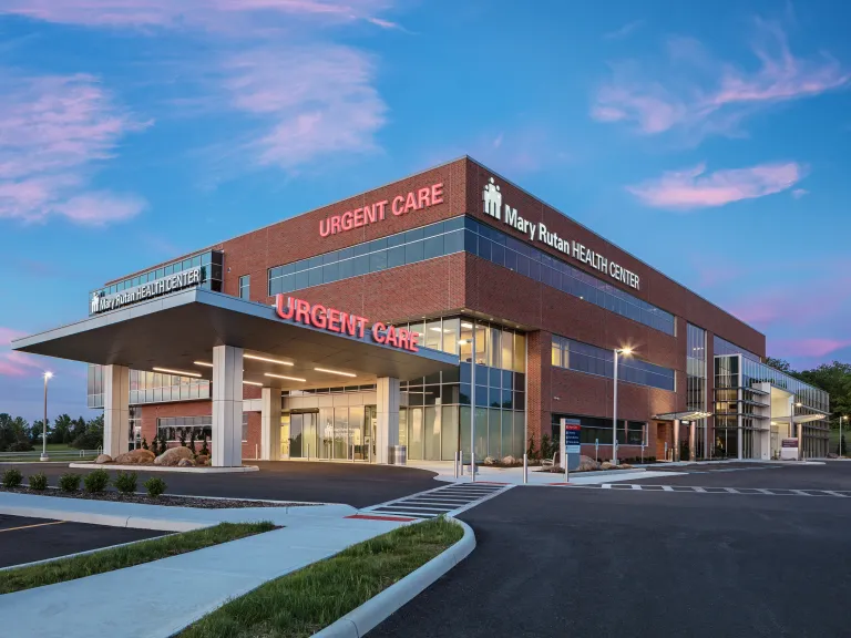 urgent care building exterior at dusk