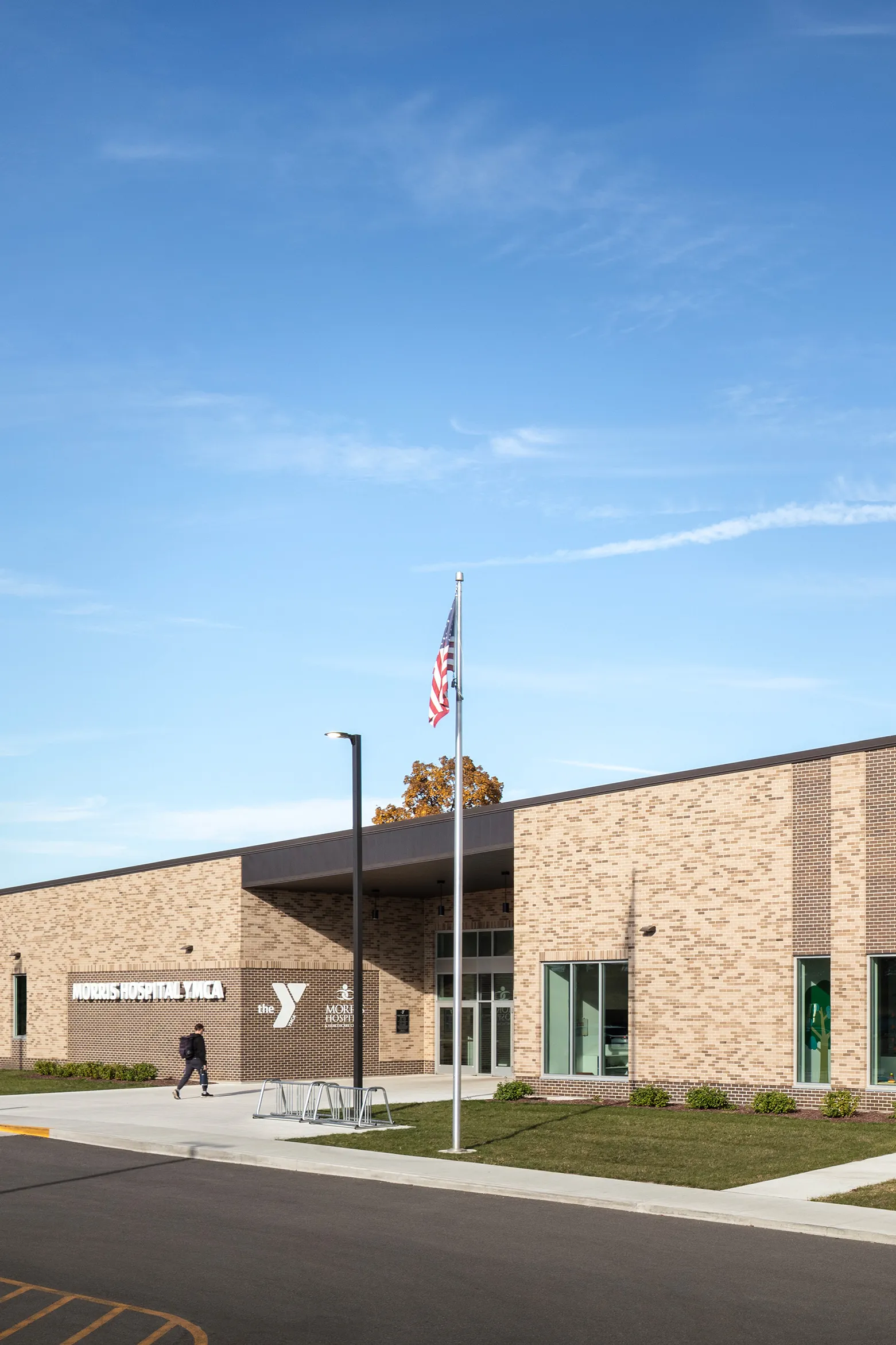 building with brick facade and playground