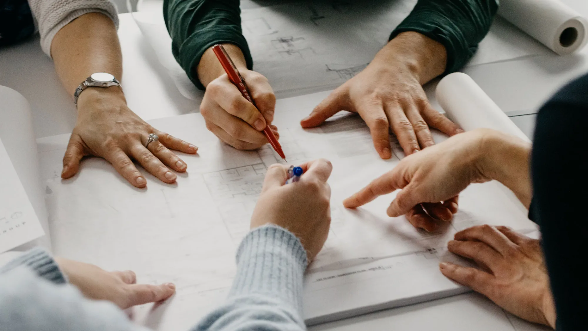 hands writing on paper