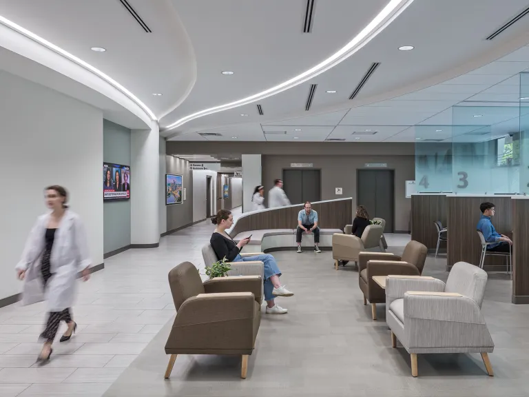 People in a waiting room in a health facility.