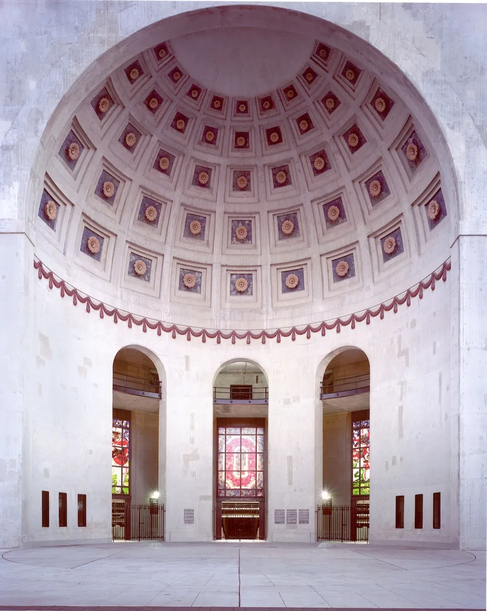 cement section of stadium with arches