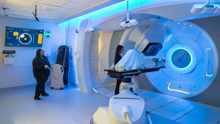 proton therapy room with blue lighting