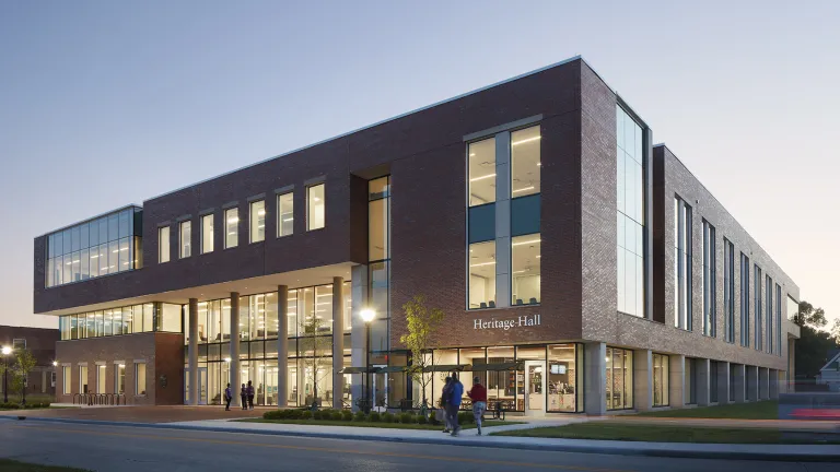 Exterior view in the evening of Heritage Hall.