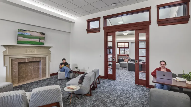 residence hall study room with various seating areas