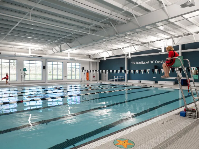 indoor pool with lifeguard